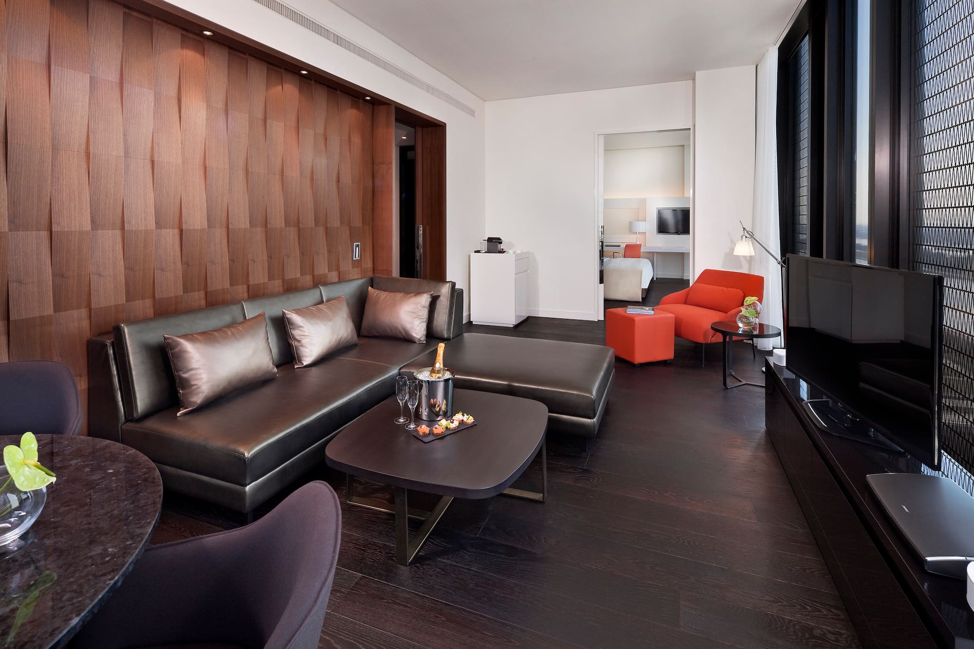 a living room with a couch and a tv