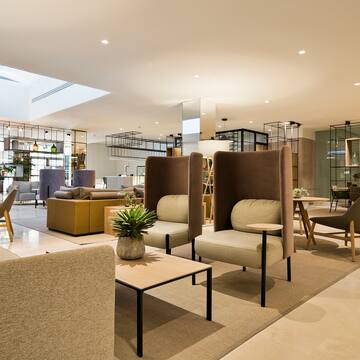 a room with chairs and tables