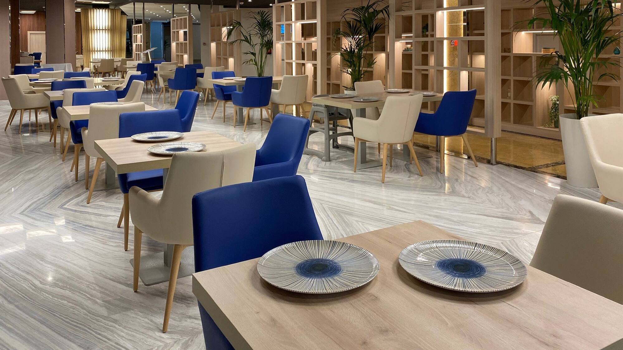 a room with tables and chairs