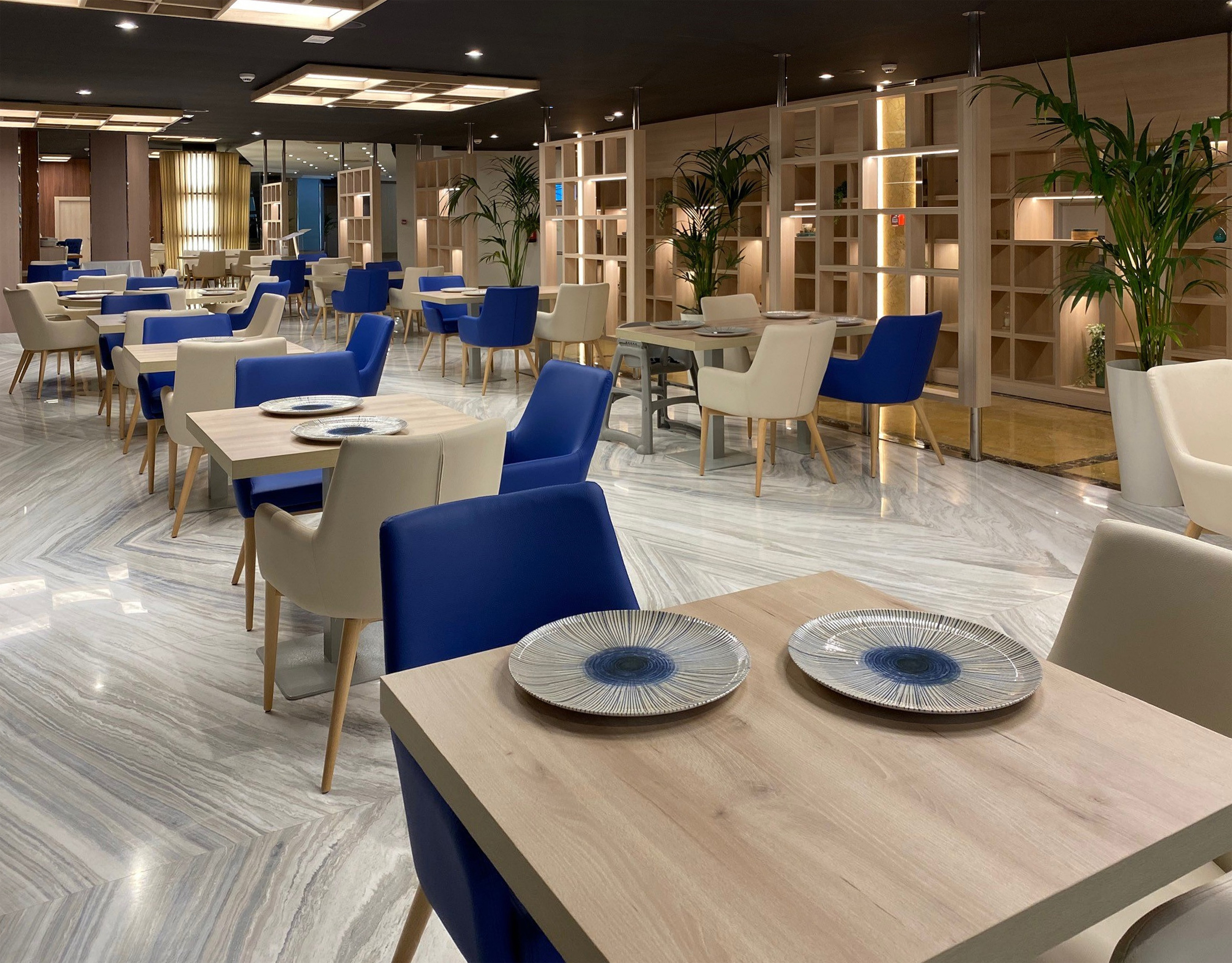 a room with tables and chairs