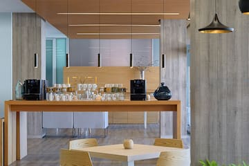 a room with a table and chairs