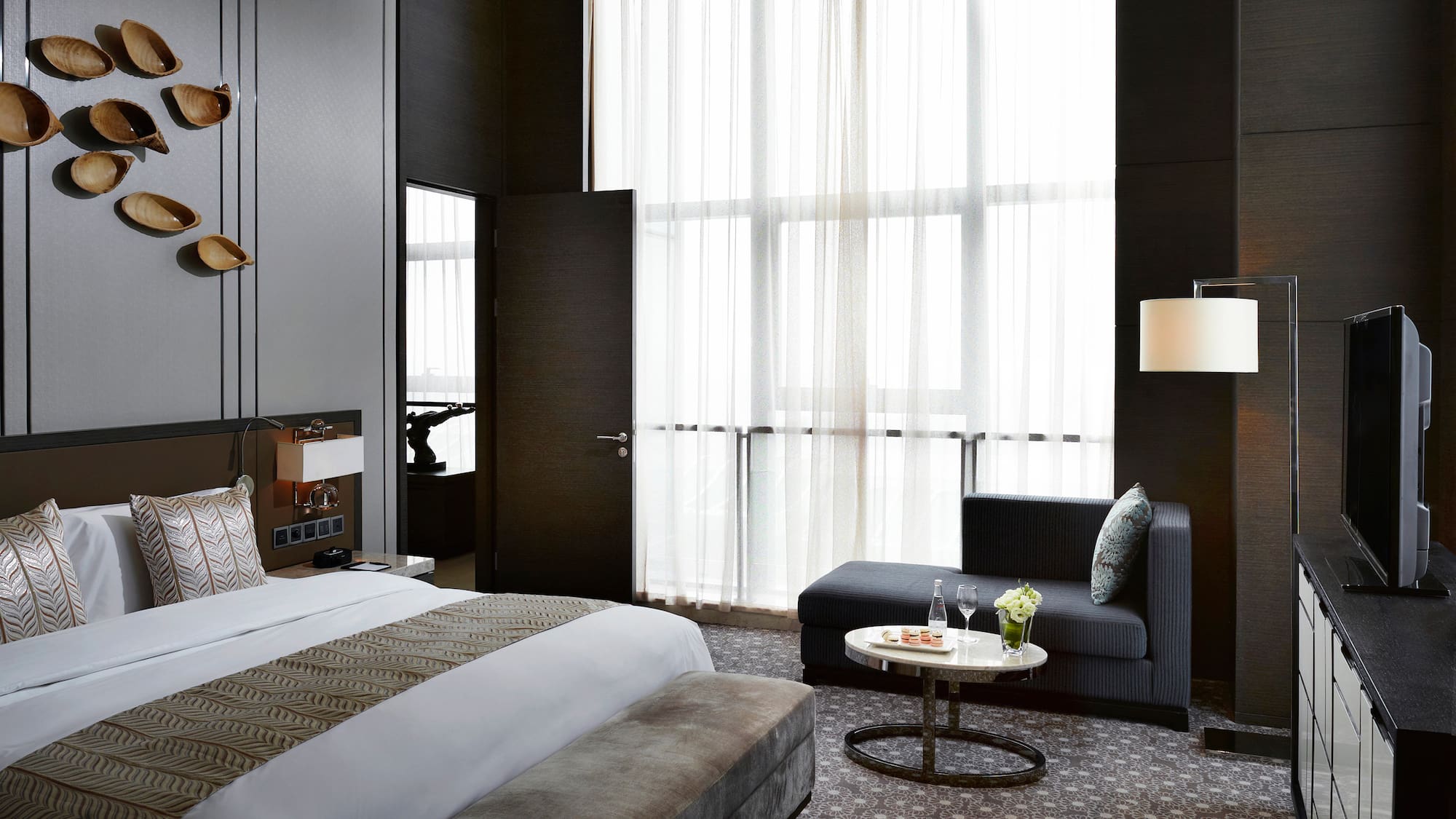 a room with a bed and a couch