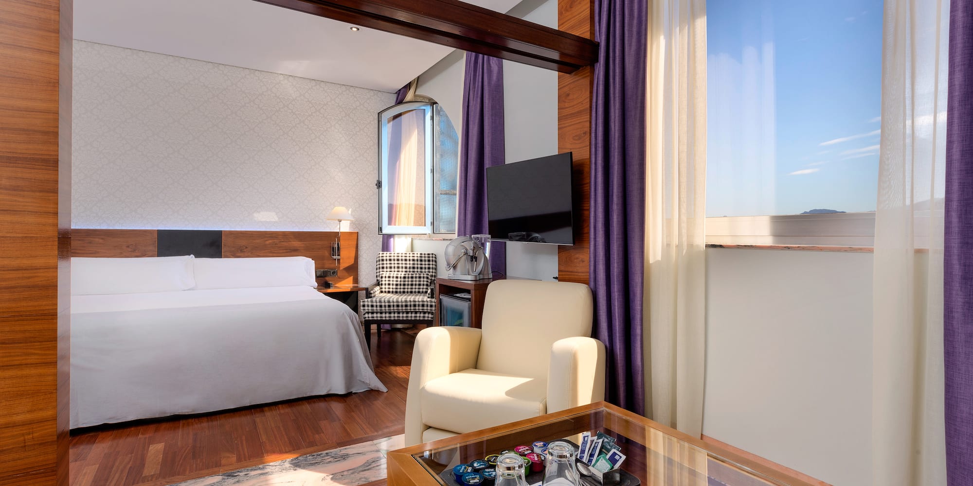 a room with a bed and a table