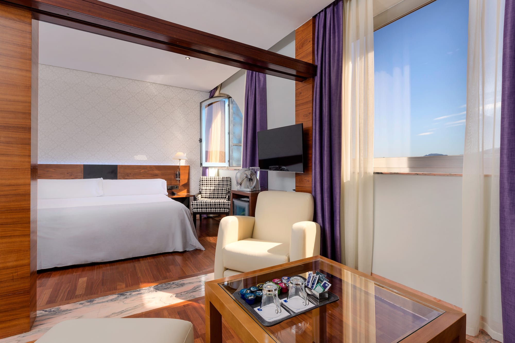 a room with a bed and a table