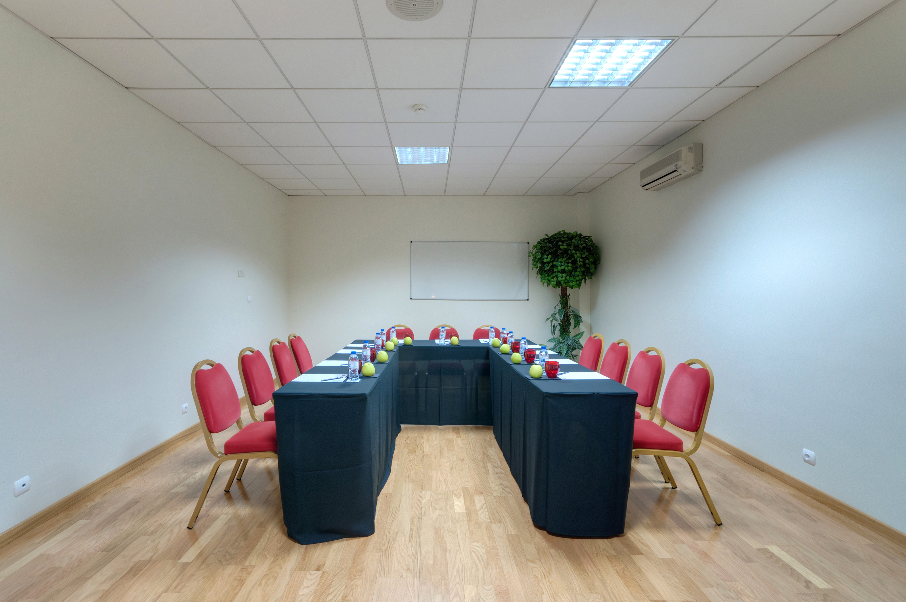 a room with a table and chairs