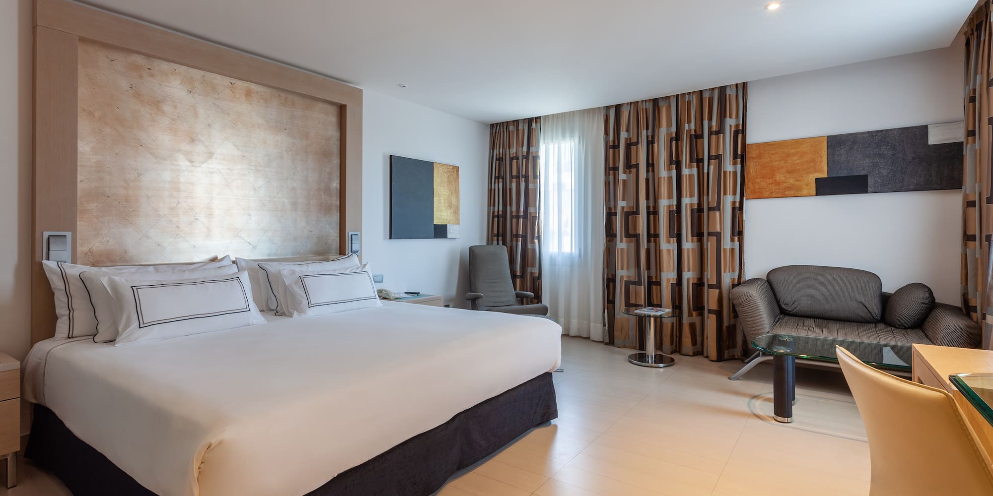 a room with a bed and a chair