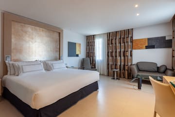 a room with a bed and a chair