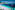 a beach with a boat in the water
