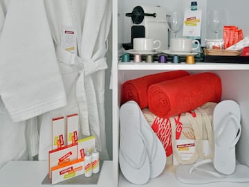 a shelf with a towel and towels