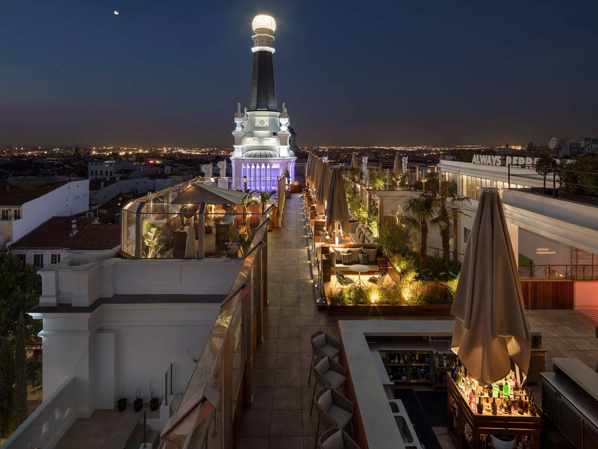 a rooftop view of a city at night