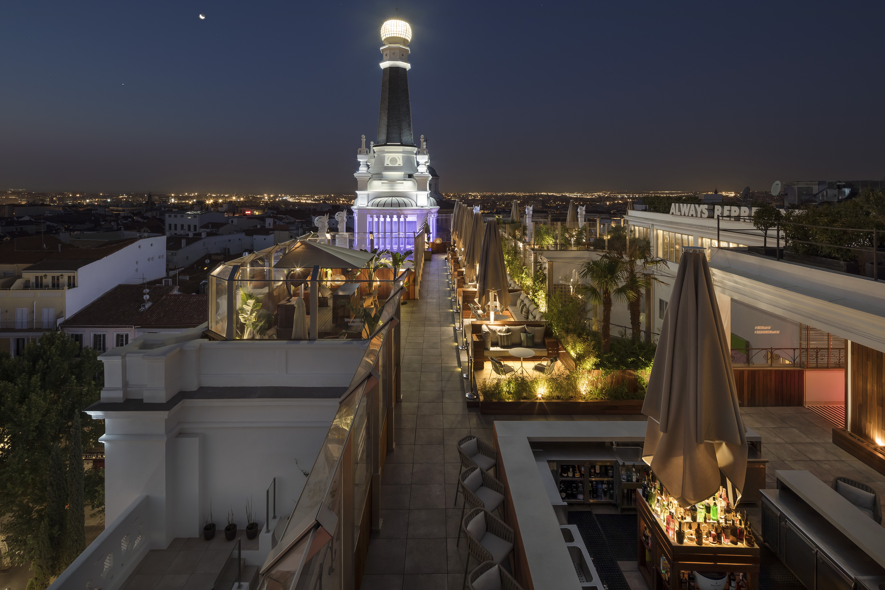 a rooftop view of a city at night