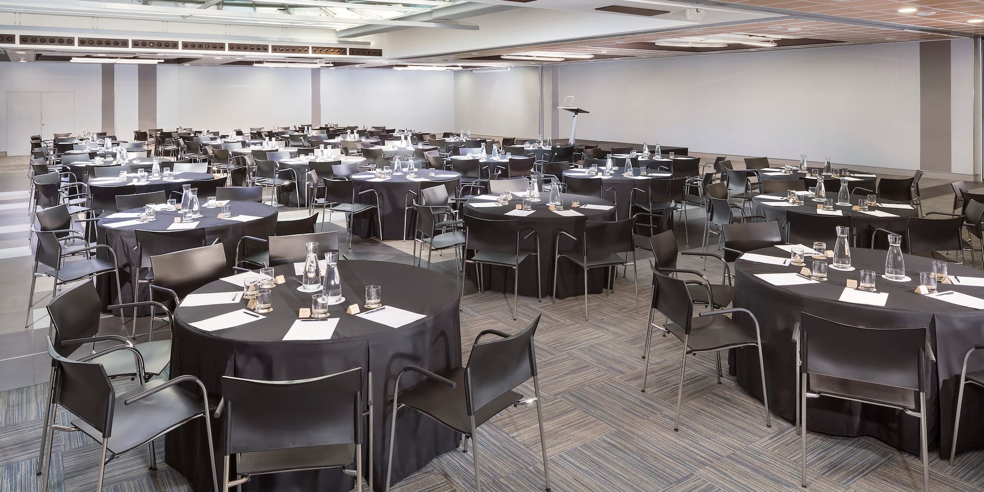 a room with tables and chairs