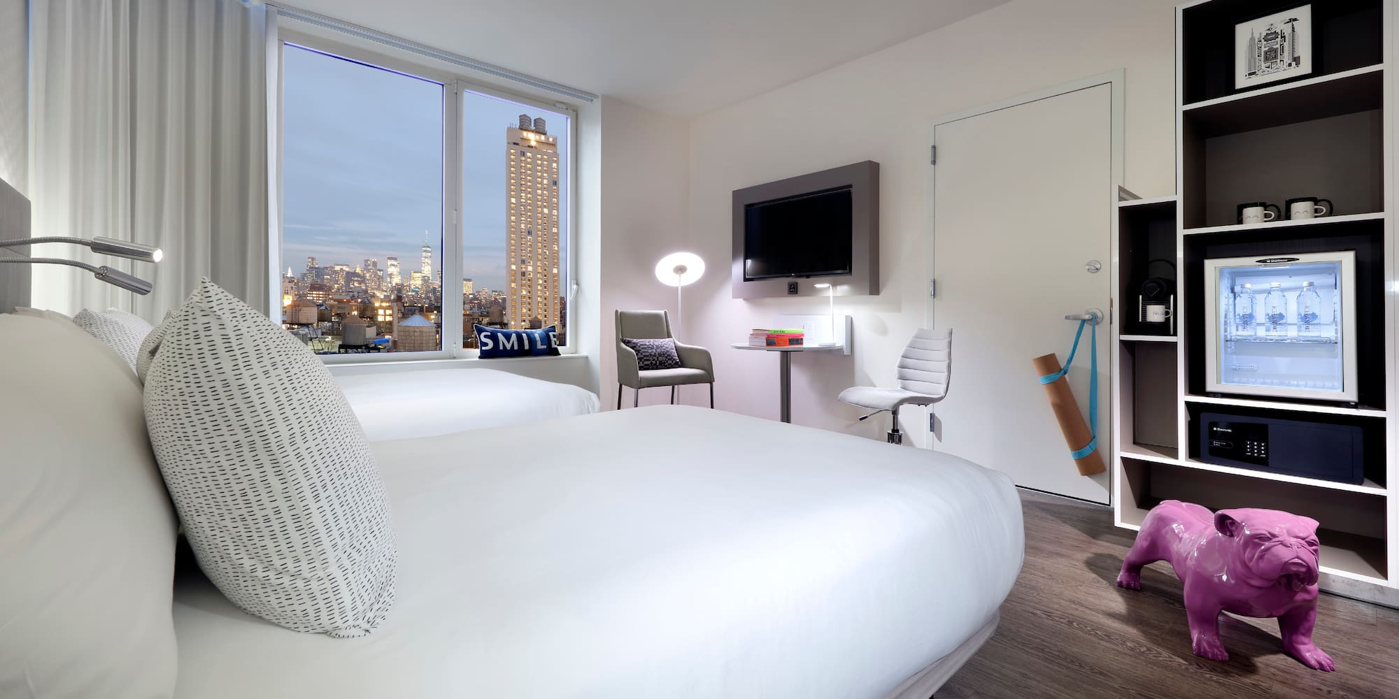 a room with a bed and a window