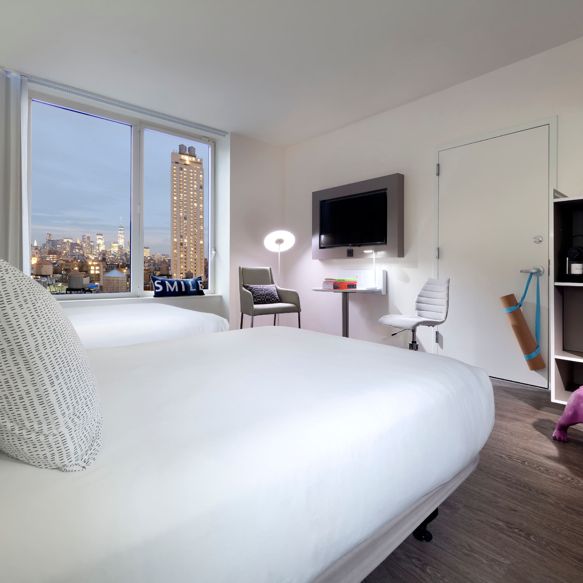 a room with a bed and a window