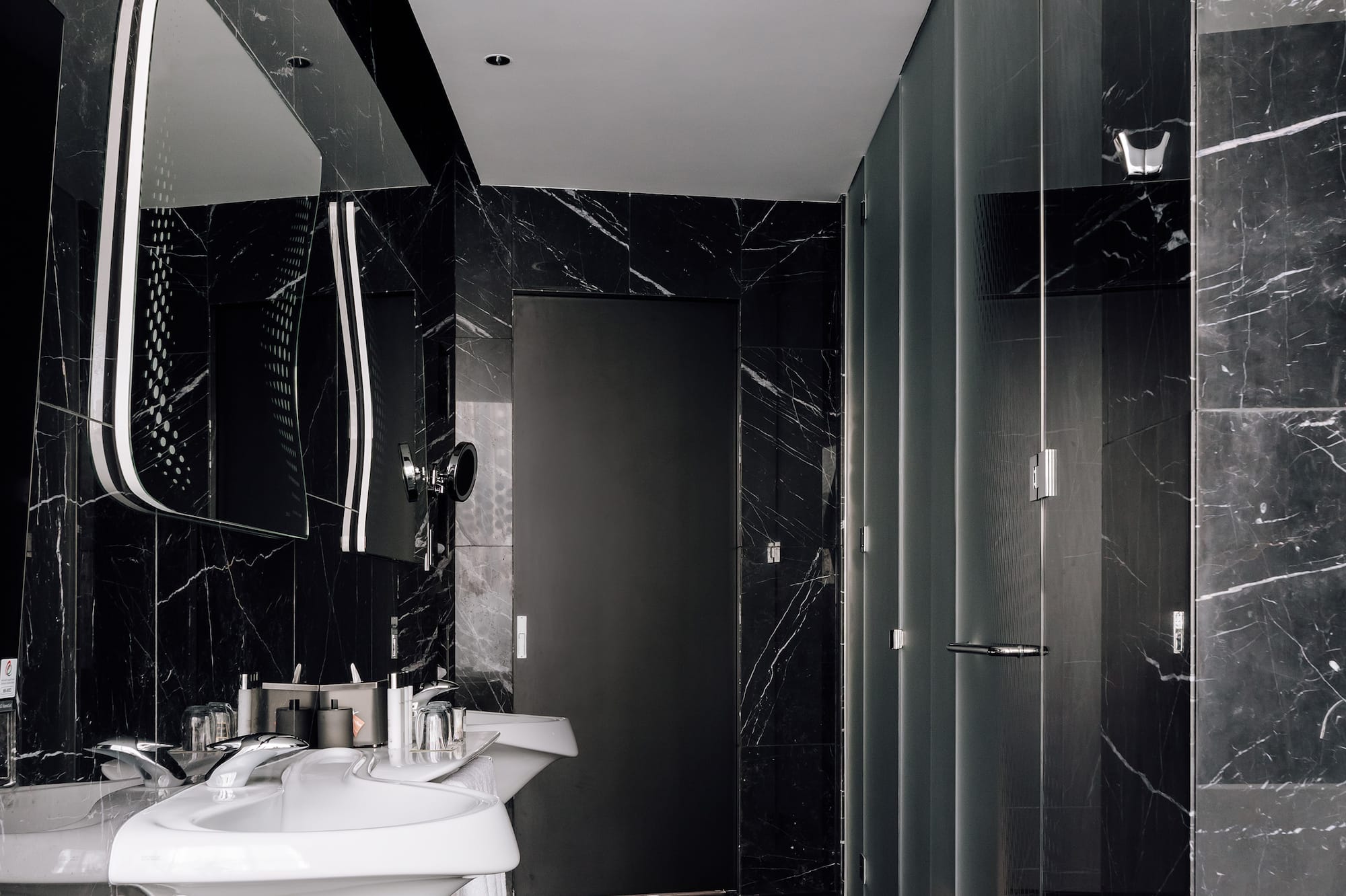 a bathroom with a sink and mirror