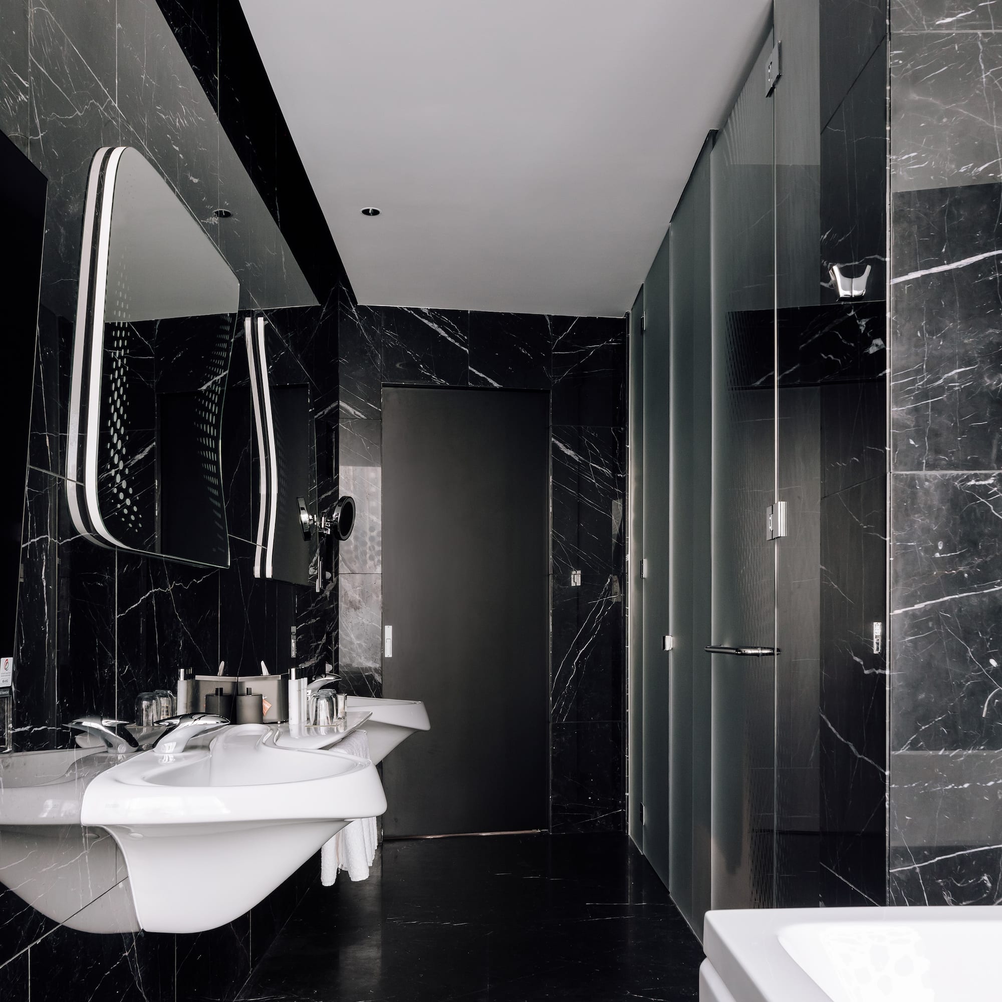 a bathroom with a sink and mirror