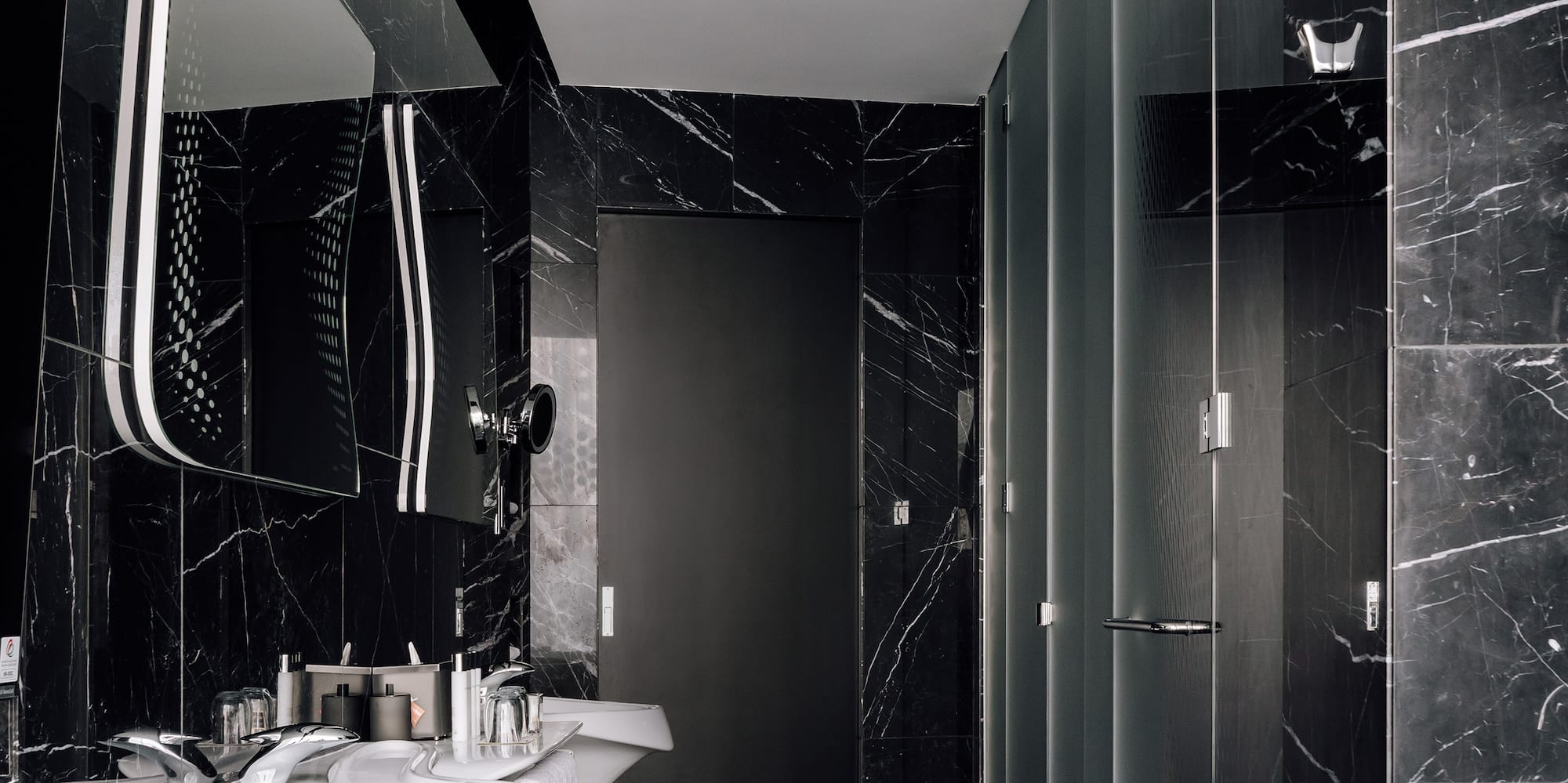 a bathroom with a sink and mirror