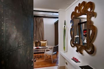 a room with a mirror and a table