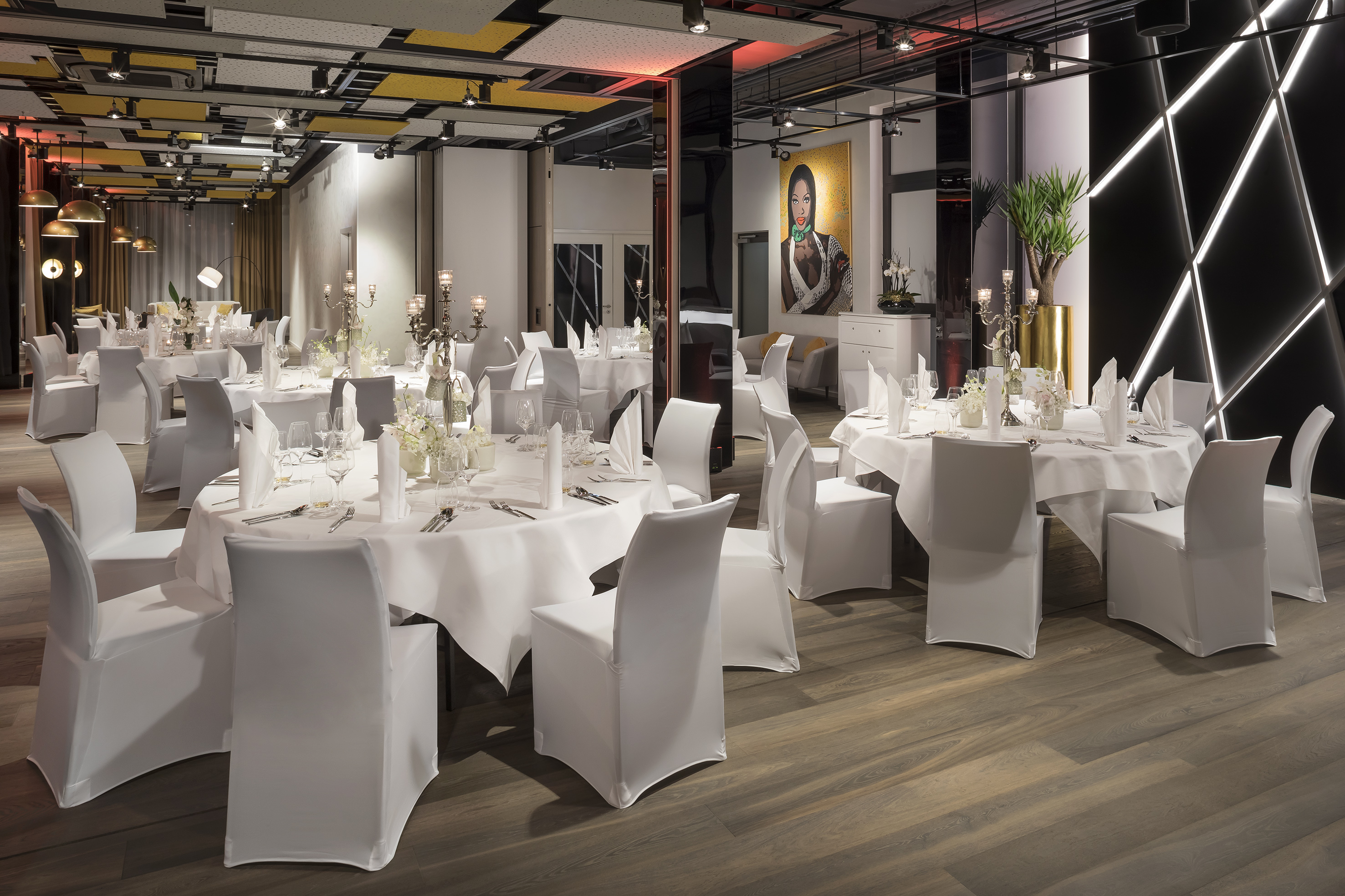 a room with tables and chairs