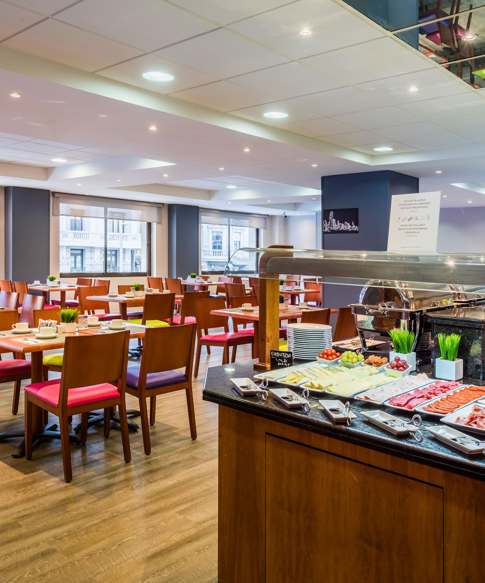 a restaurant with many tables and chairs