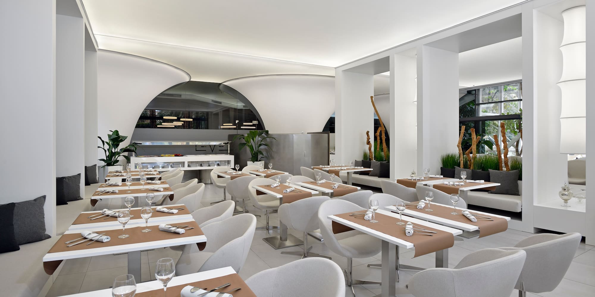 a restaurant with tables and chairs