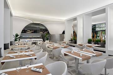a restaurant with tables and chairs