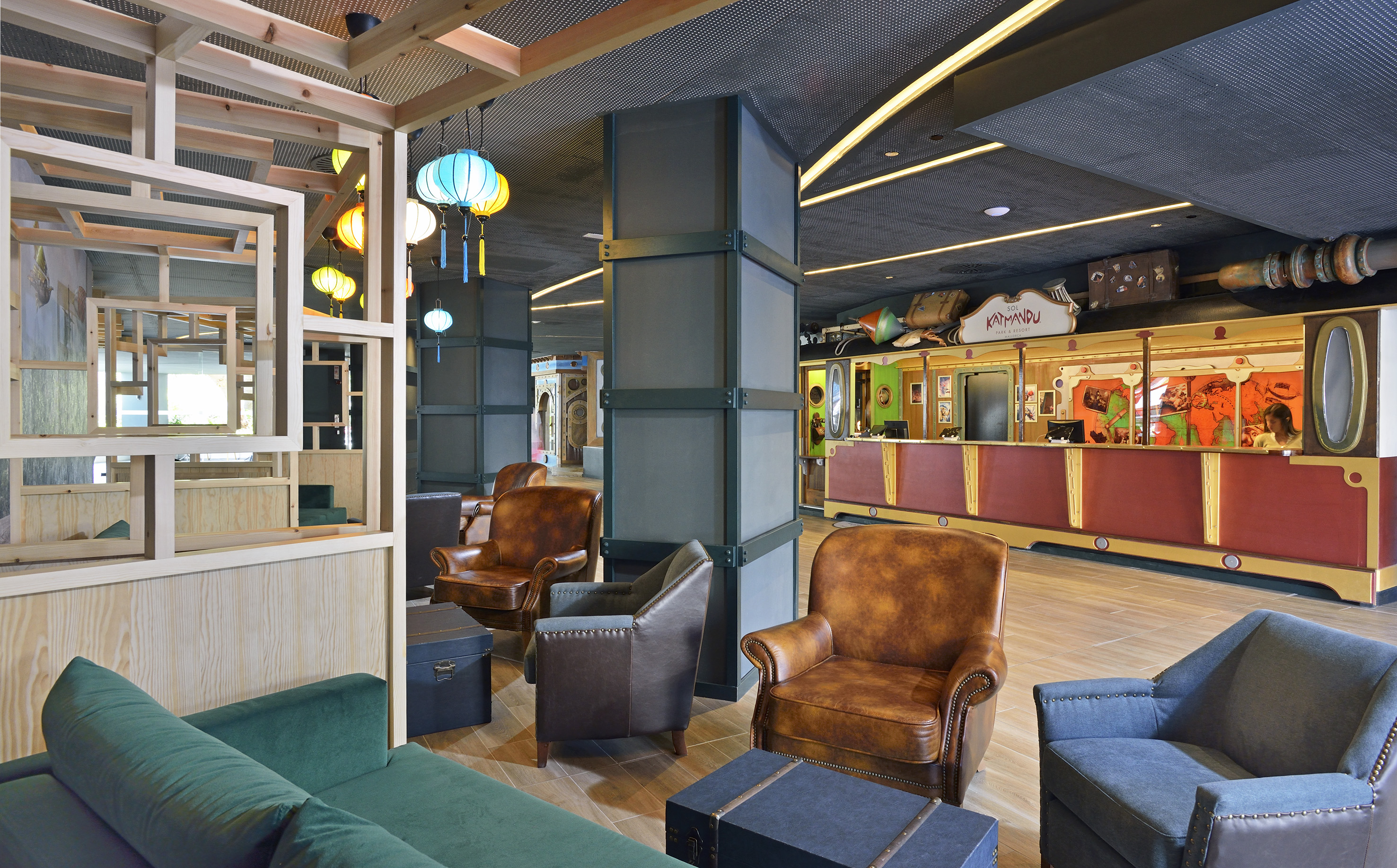 Adventure-themed hotel lobby with Sol Katmandu reception and comfortable seating.
