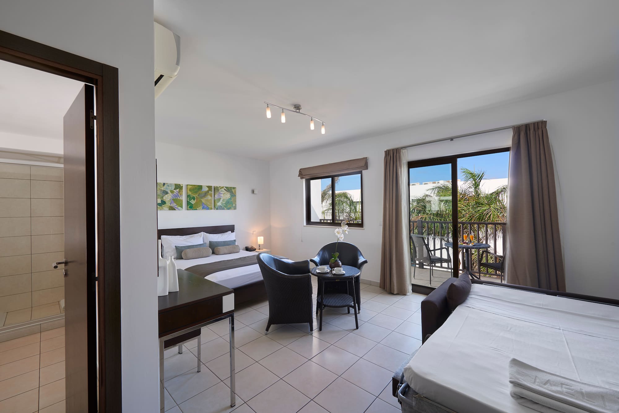 a room with a bed and a table