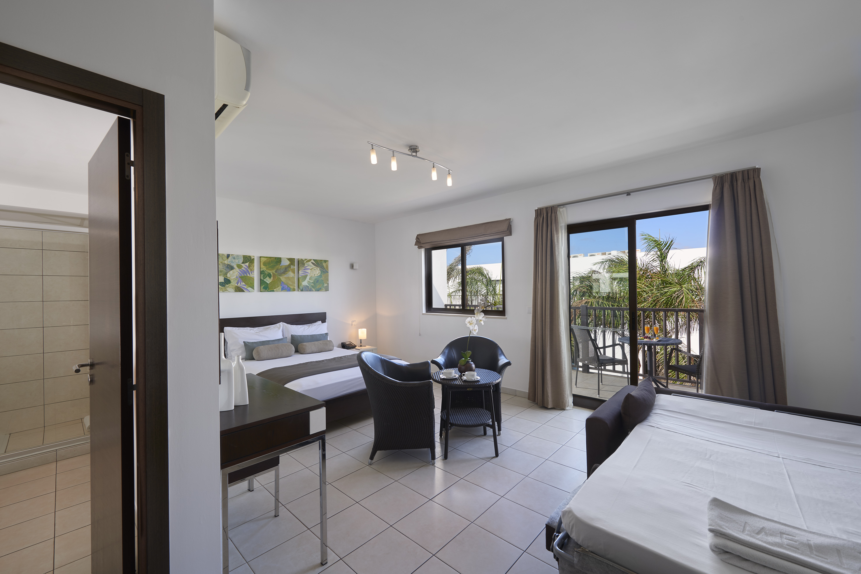 a room with a bed and a table