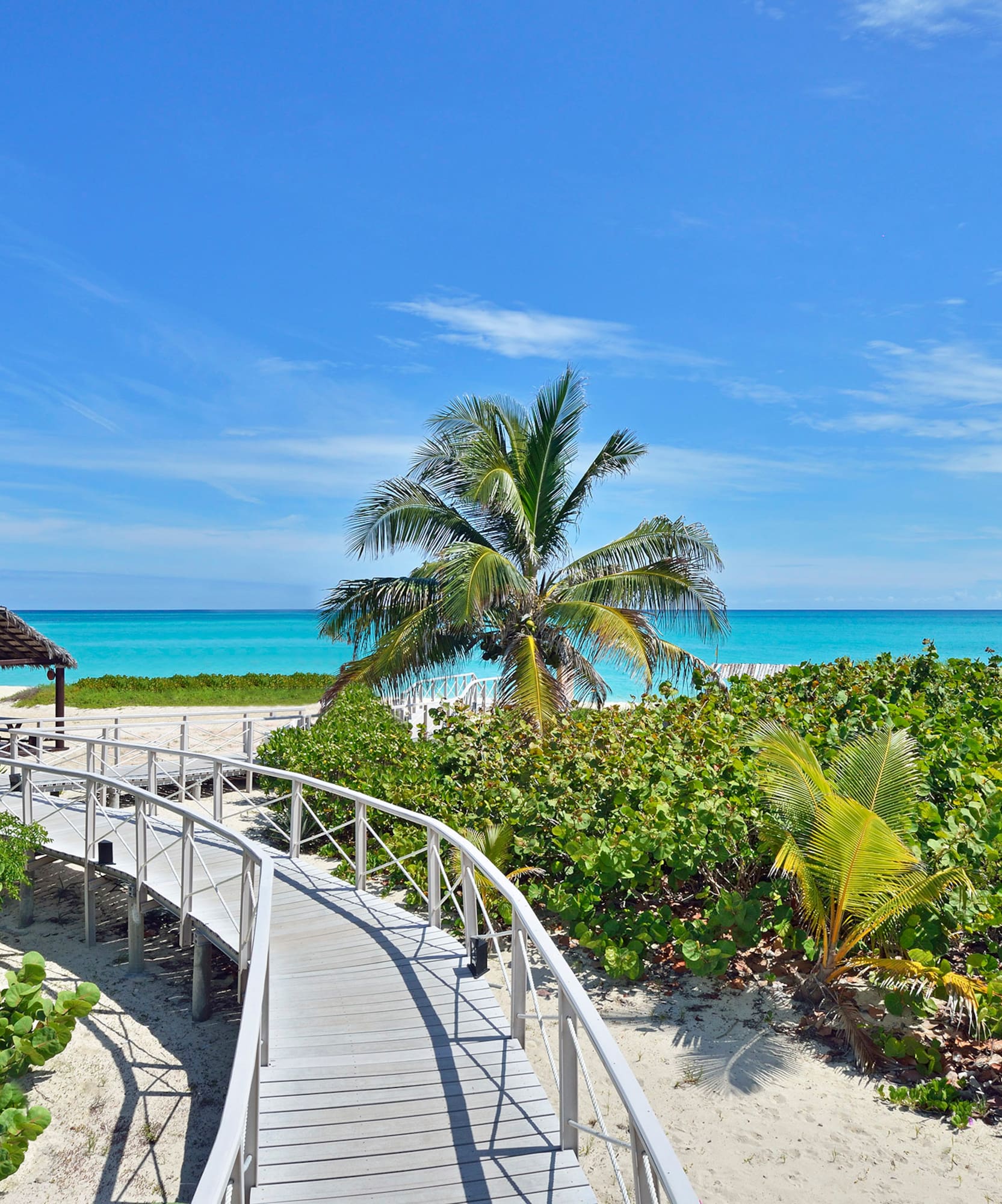 a walkway leading to a beach