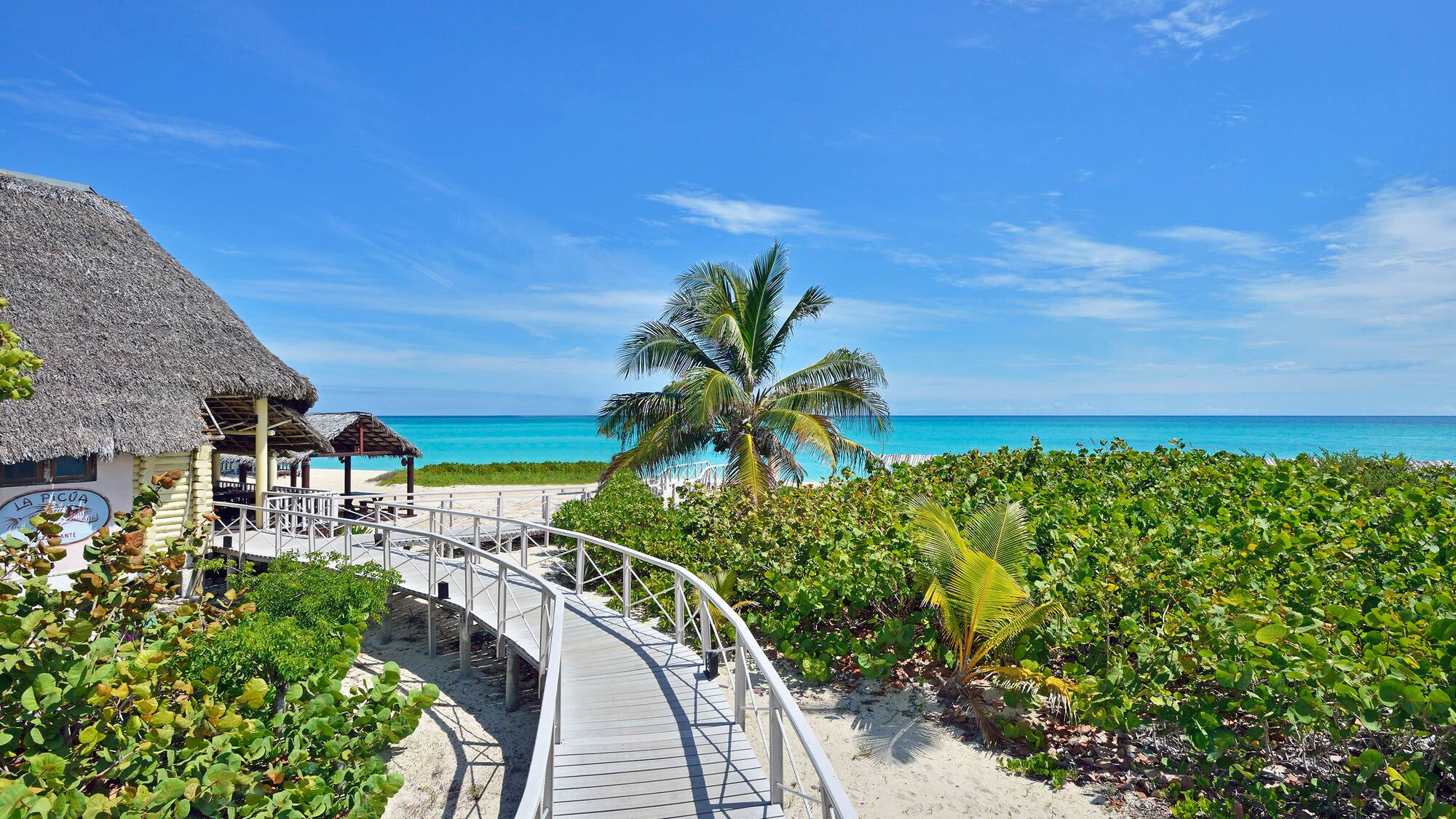 a walkway leading to a beach
