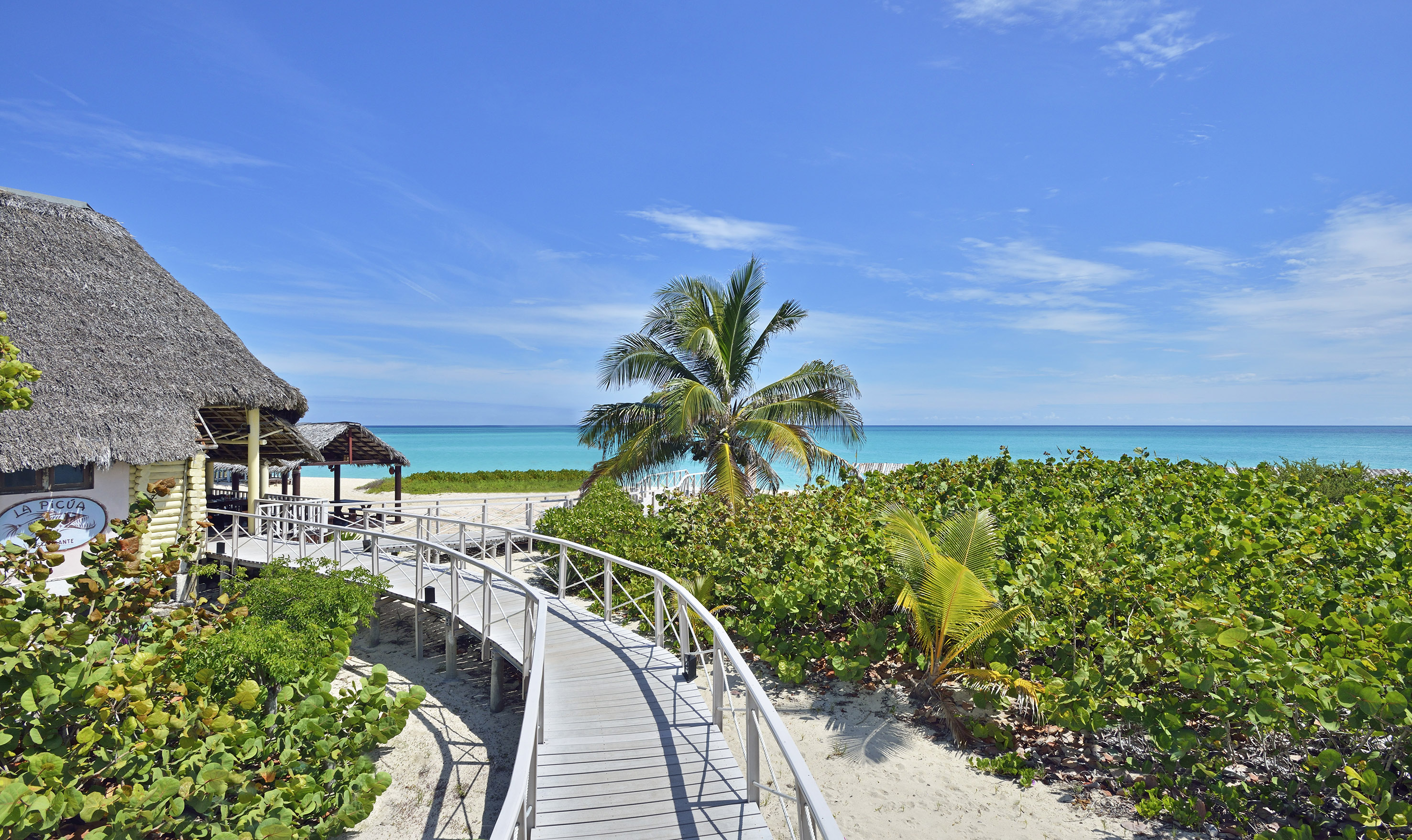a walkway leading to a beach