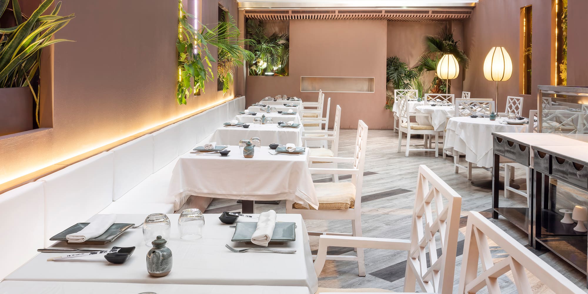 a restaurant with tables and chairs