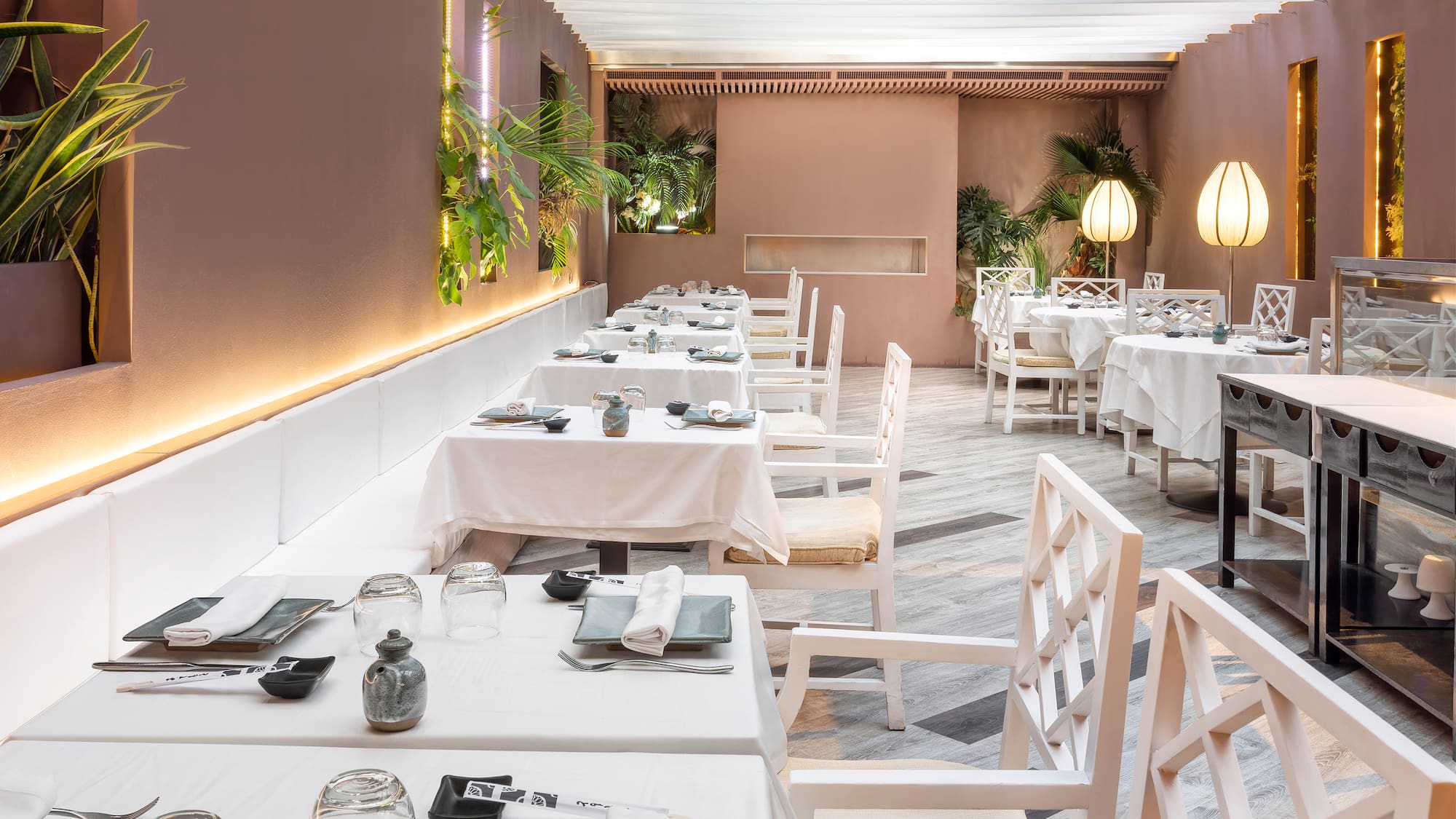 a restaurant with tables and chairs