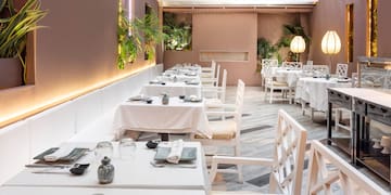 a restaurant with tables and chairs