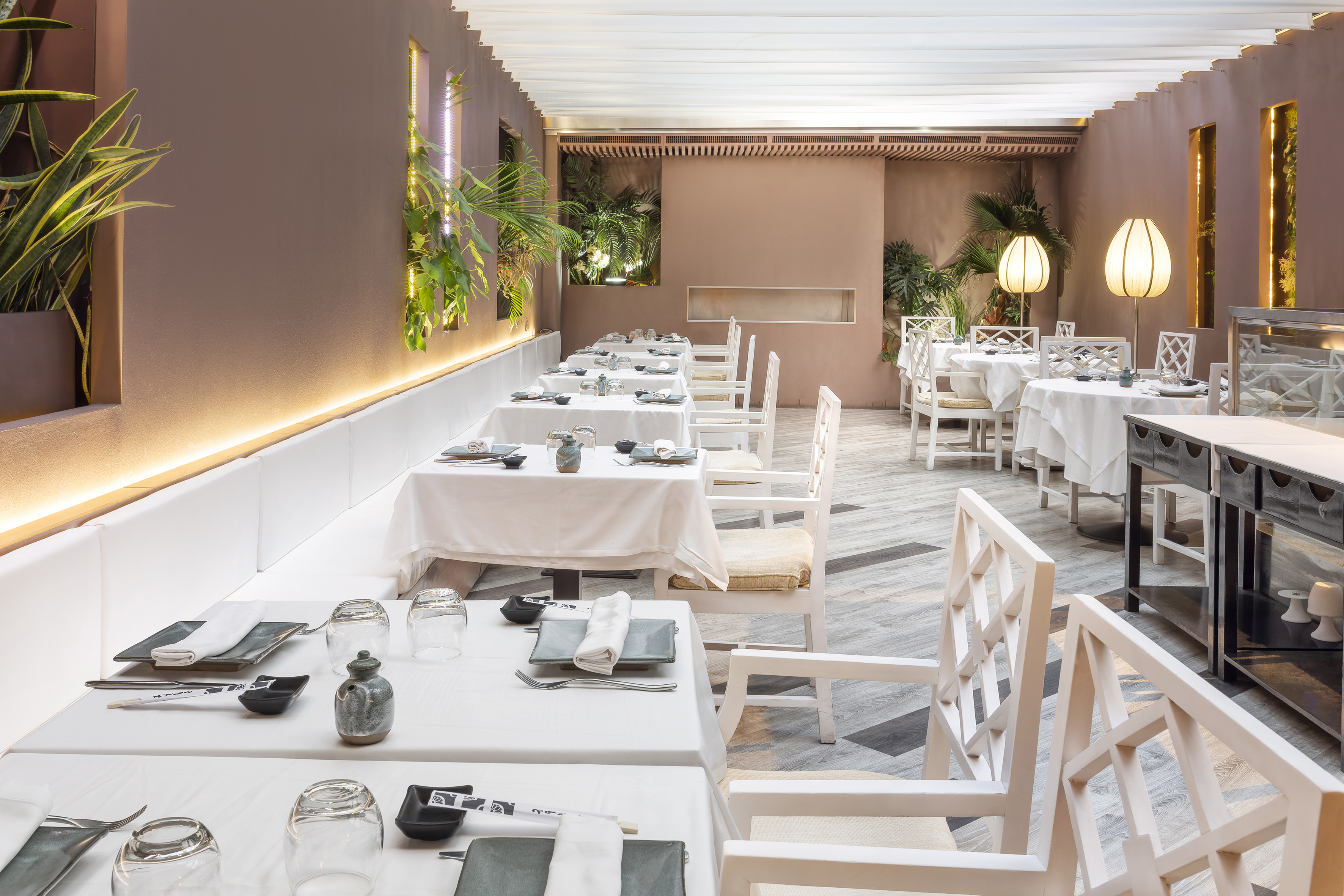 a restaurant with tables and chairs