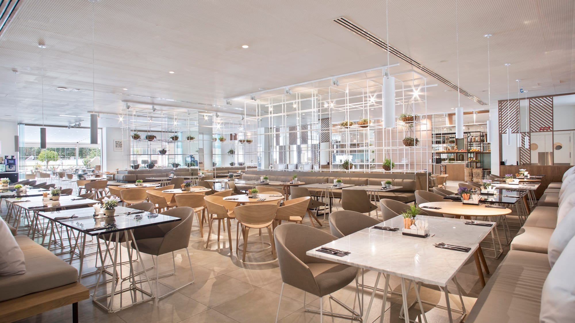 a large room with tables and chairs