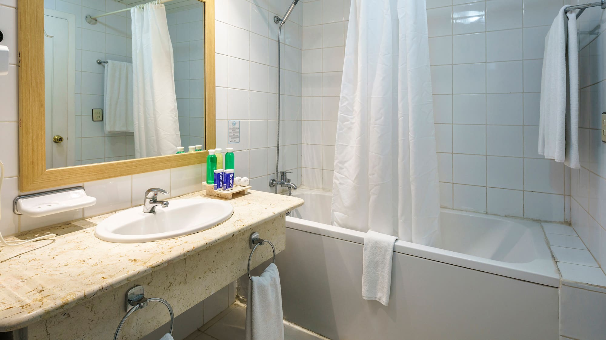 a bathroom with a sink and bathtub