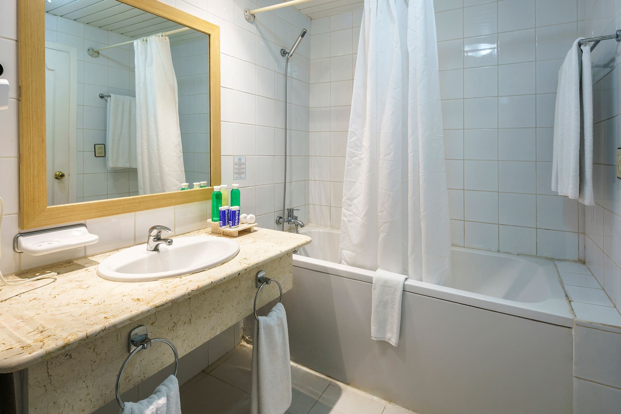 a bathroom with a sink and bathtub