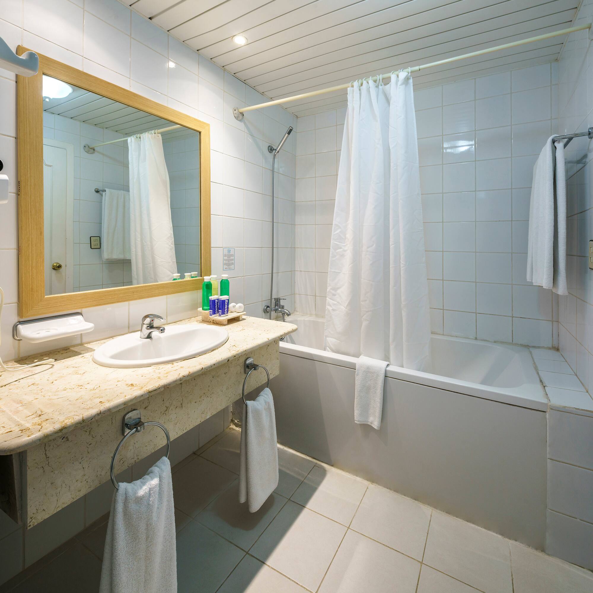 a bathroom with a sink and bathtub