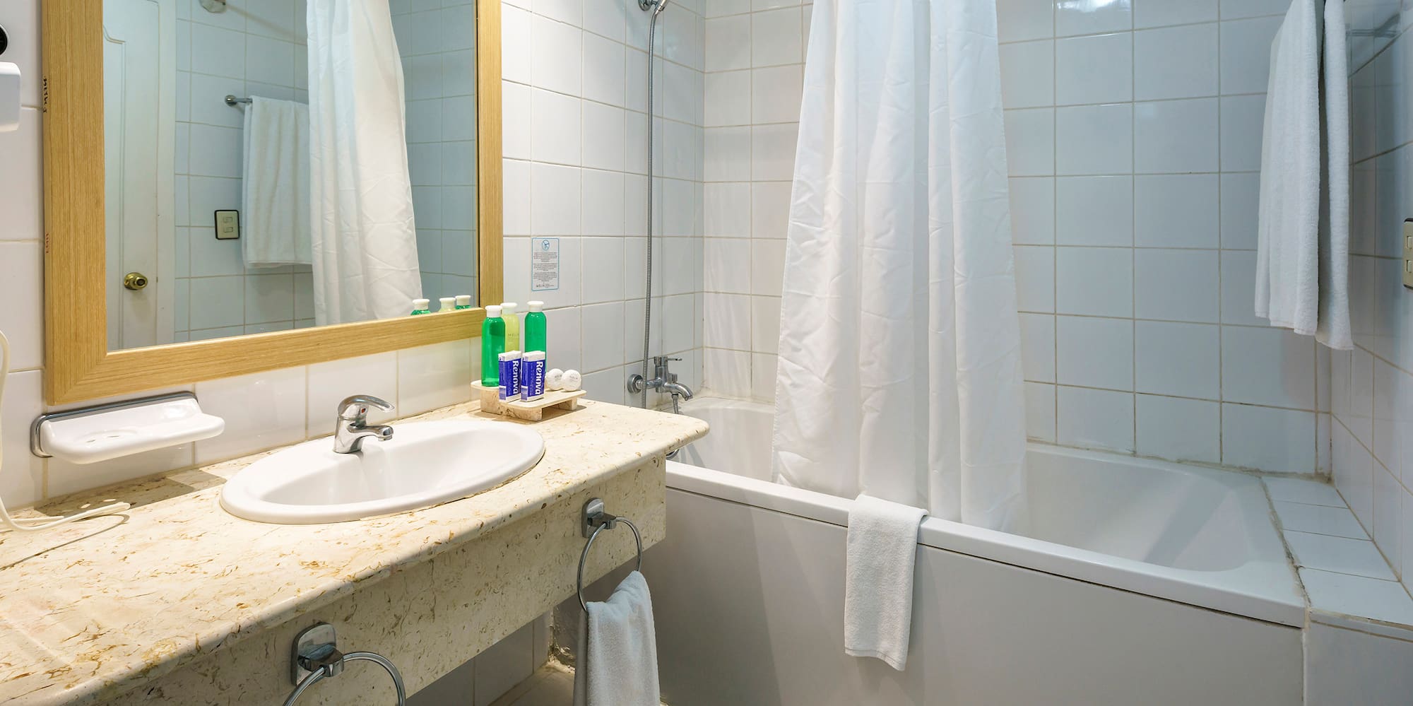 a bathroom with a sink and bathtub