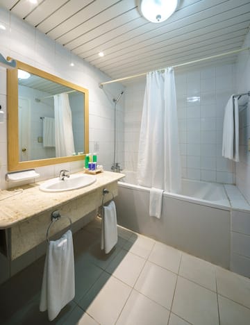 a bathroom with a sink and bathtub