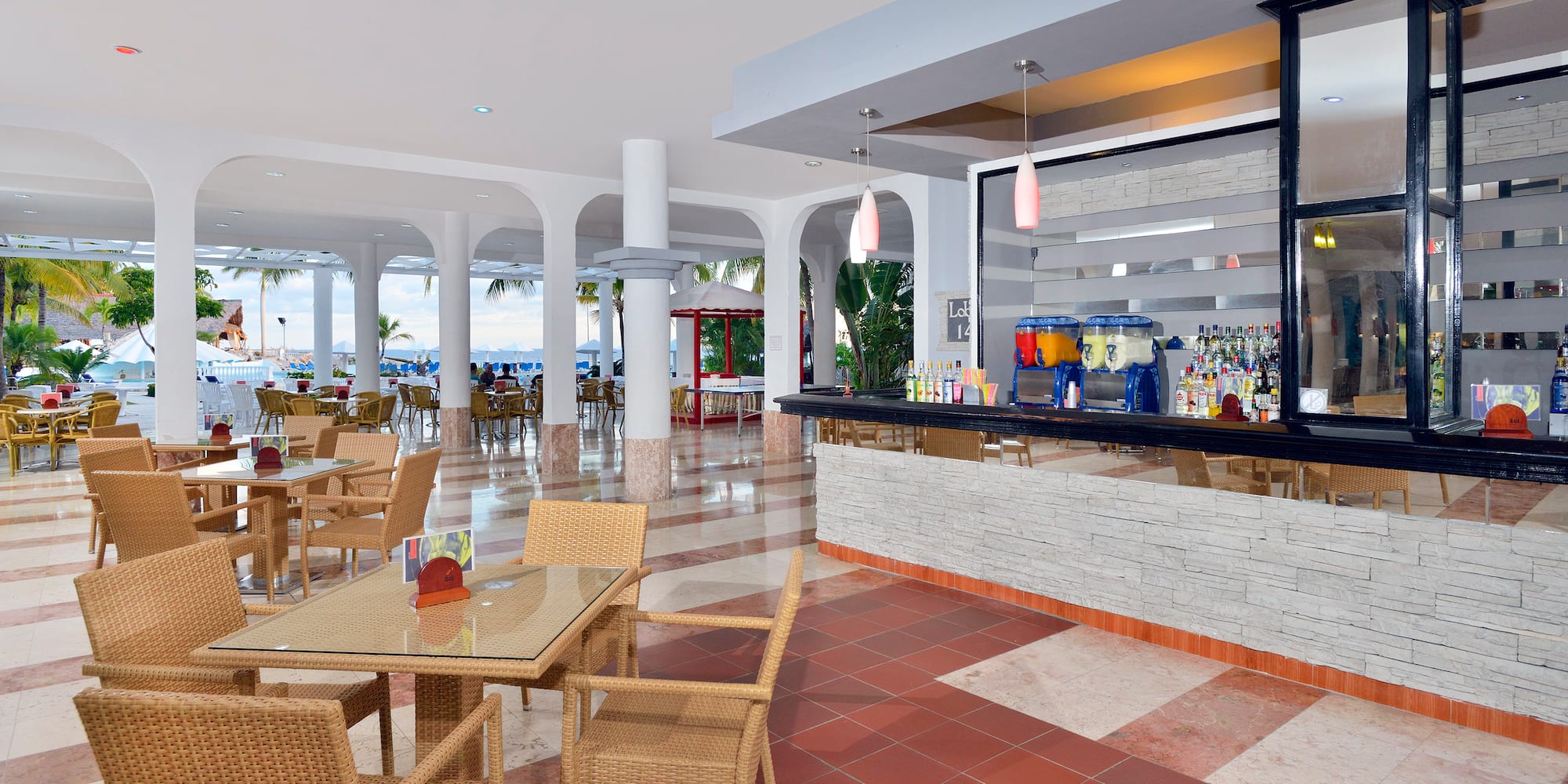 a restaurant with tables and chairs