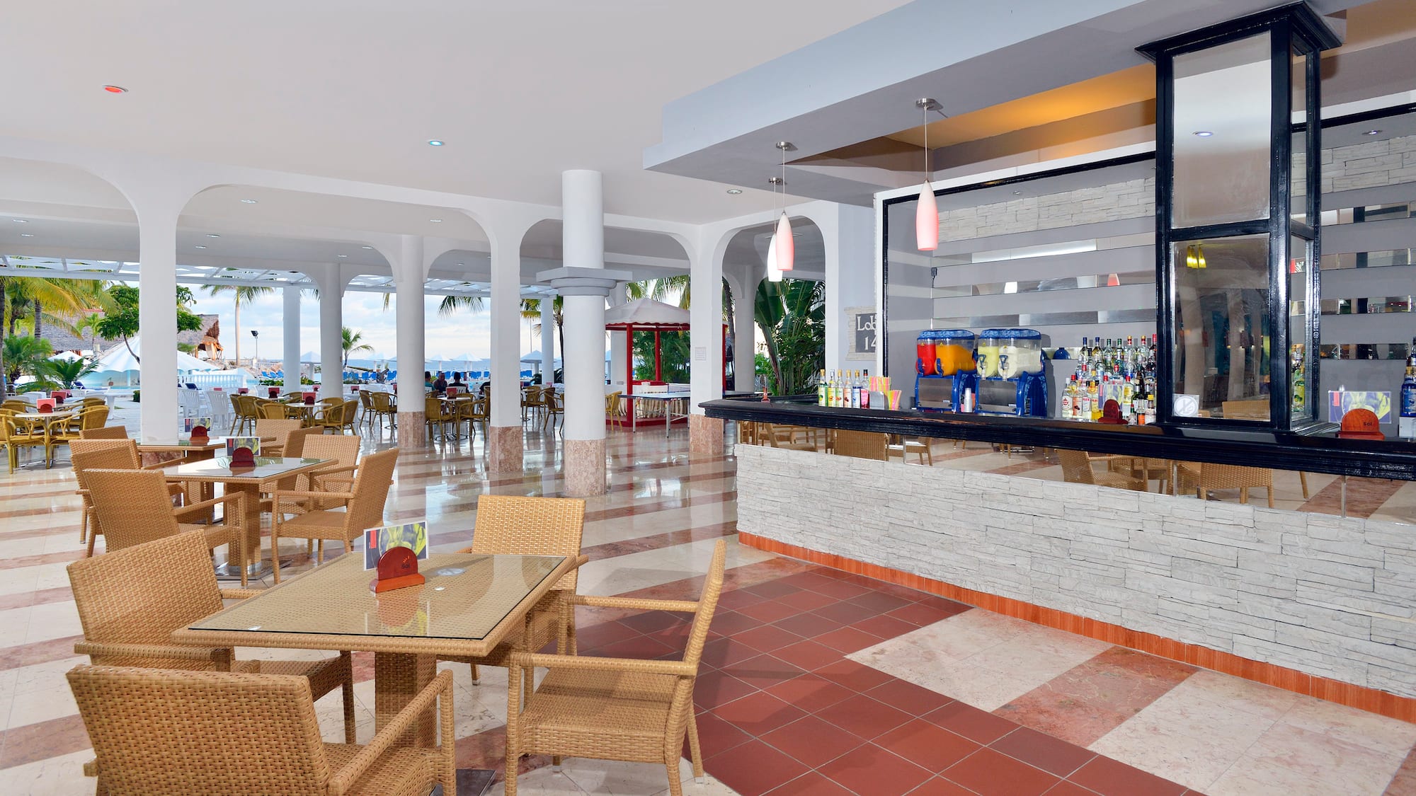 a restaurant with tables and chairs