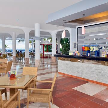 a restaurant with tables and chairs