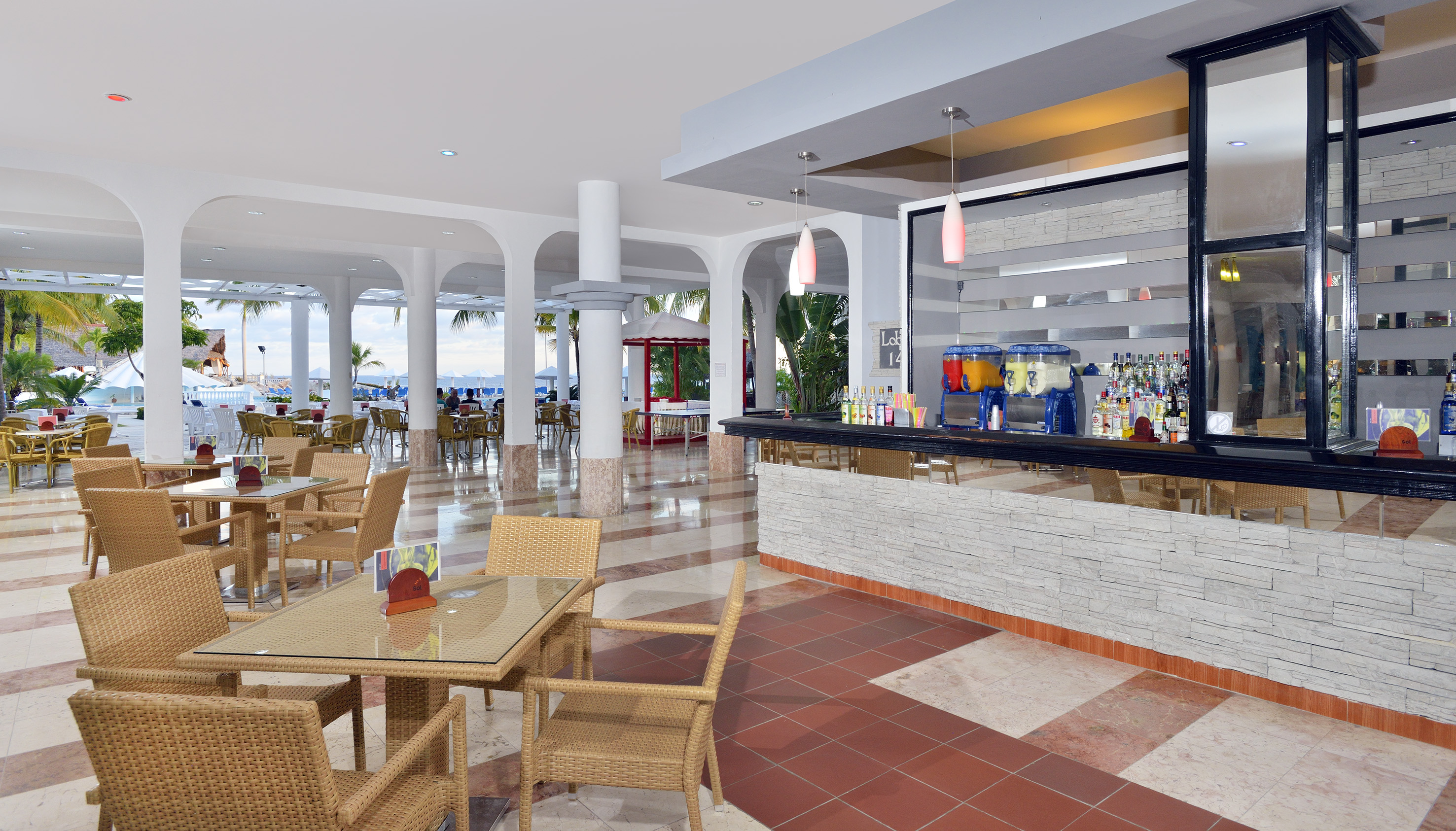 a restaurant with tables and chairs