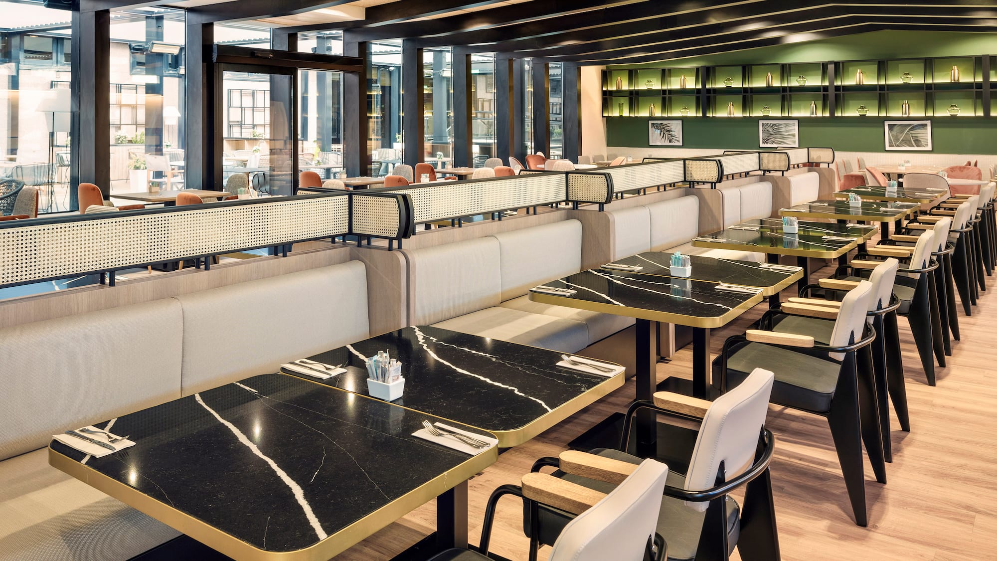 a restaurant with tables and chairs