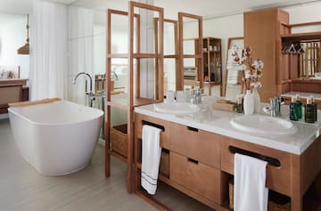 a bathroom with a tub and sink