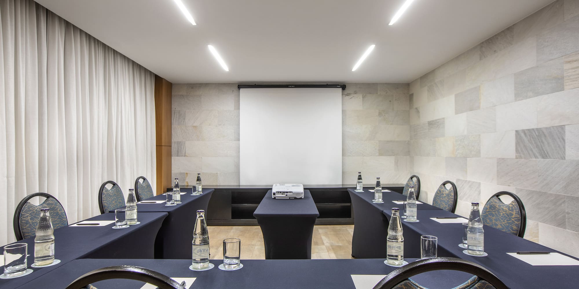 a room with tables and chairs