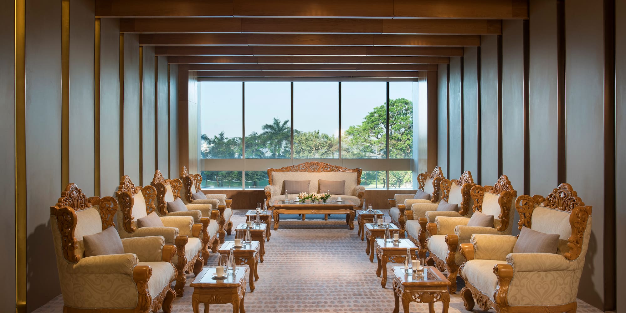 a room with many chairs and tables